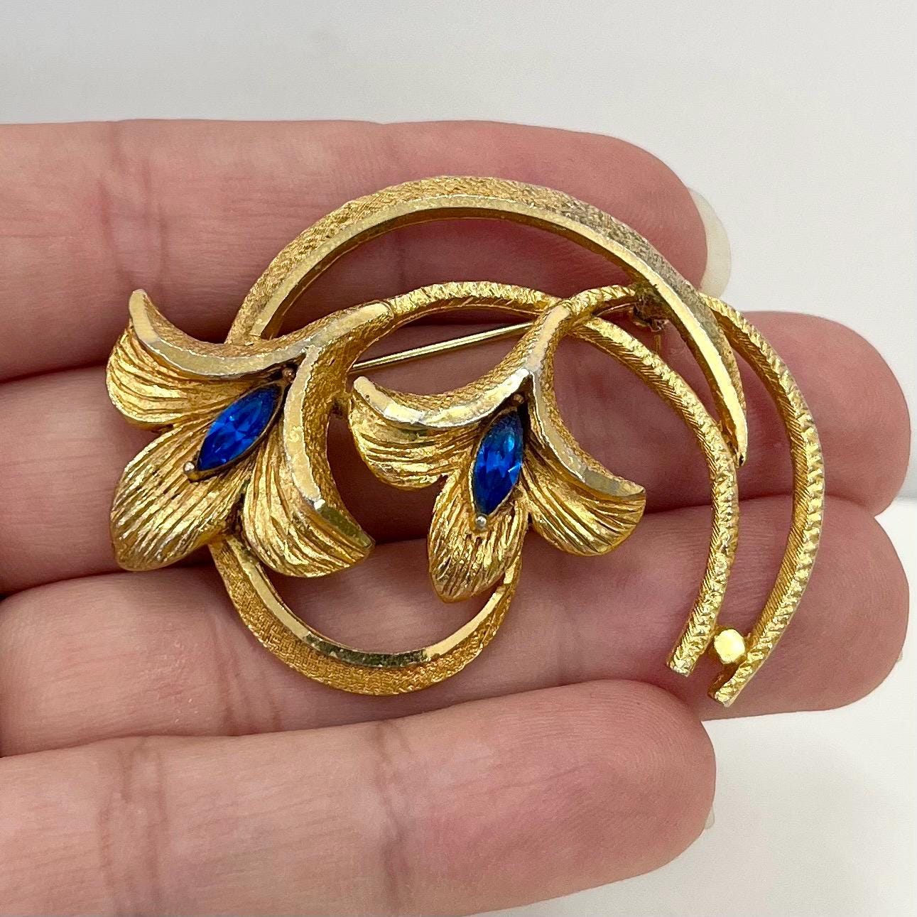 Vintage Gold Tone Floral Brutalist Style Brooch with Blue Marquise Cut Crystal Accents Contempory Costume Jewellery Statement Piece TheGreenGlassGemShop