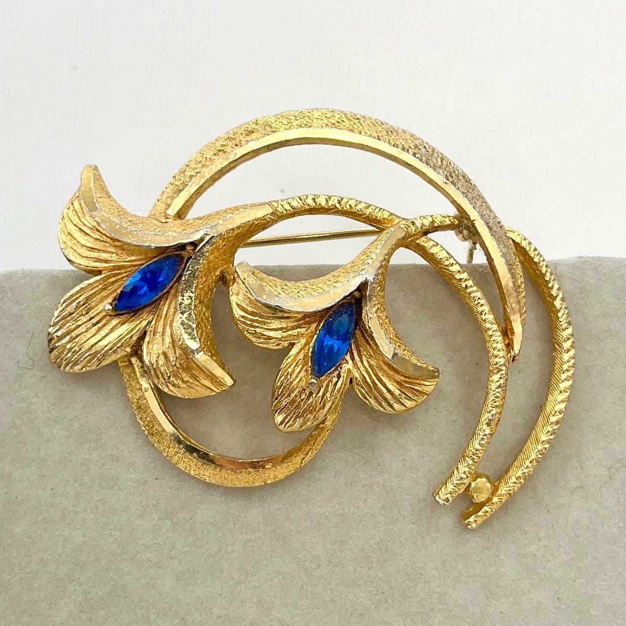 Vintage Gold Tone Floral Brutalist Style Brooch with Blue Marquise Cut Crystal Accents Contempory Costume Jewellery Statement Piece TheGreenGlassGemShop