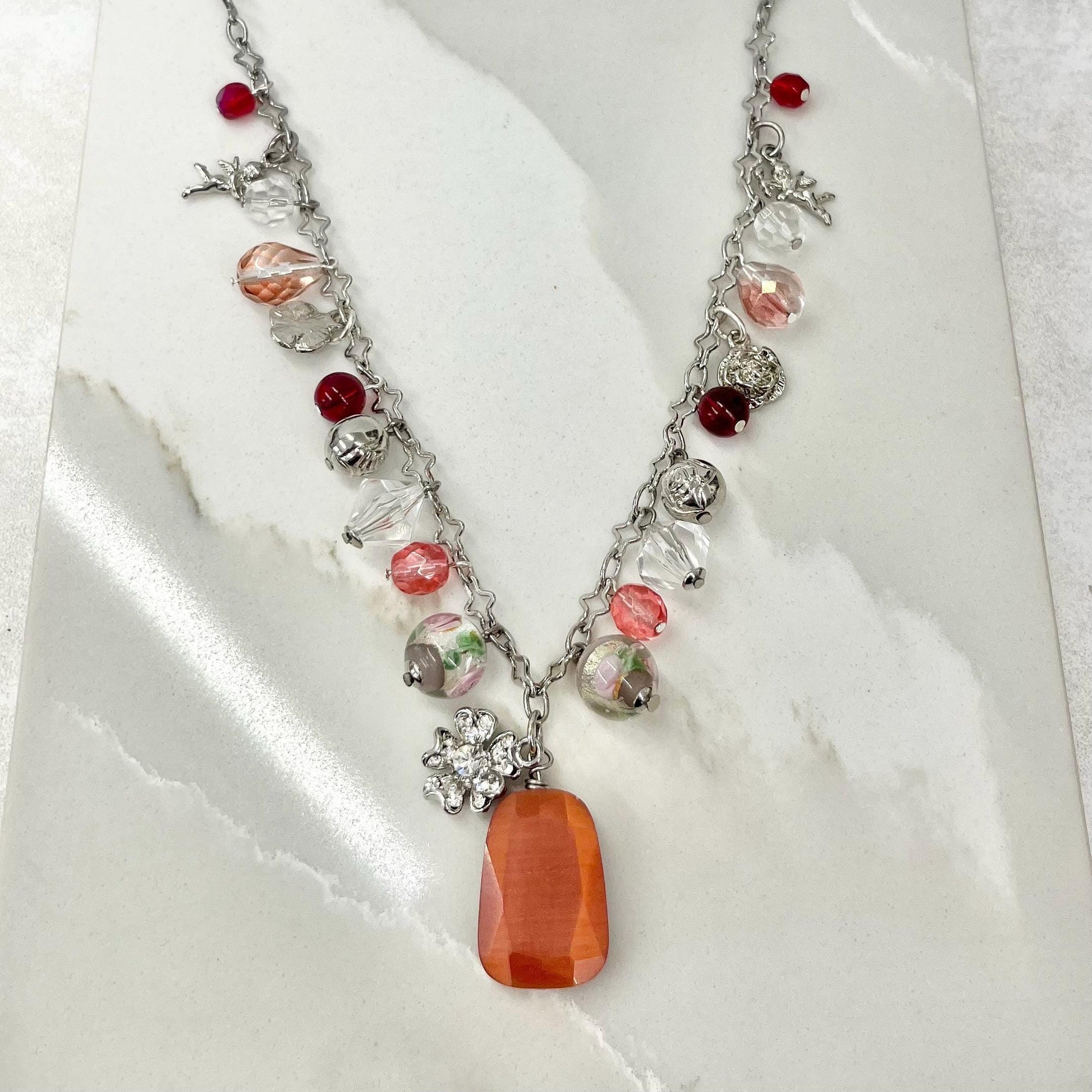 Peach Pink & Red Glass and Crystal Beaded Cherub and Flower Charm Drop Necklace 20” Long Chain - by Milly Oliver MillyOliverVintage