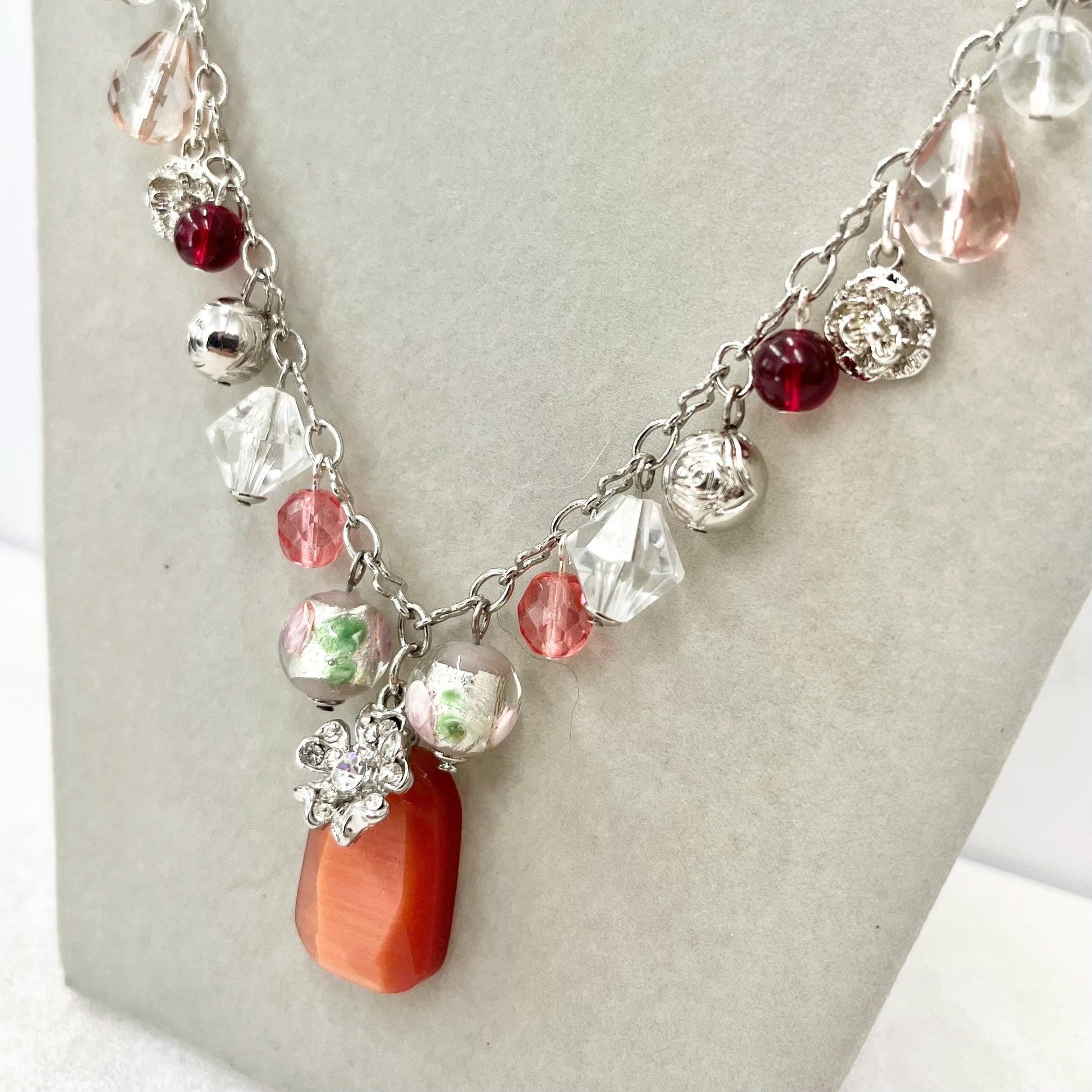 Peach Pink & Red Glass and Crystal Beaded Cherub and Flower Charm Drop Necklace 20” Long Chain - by Milly Oliver MillyOliverVintage
