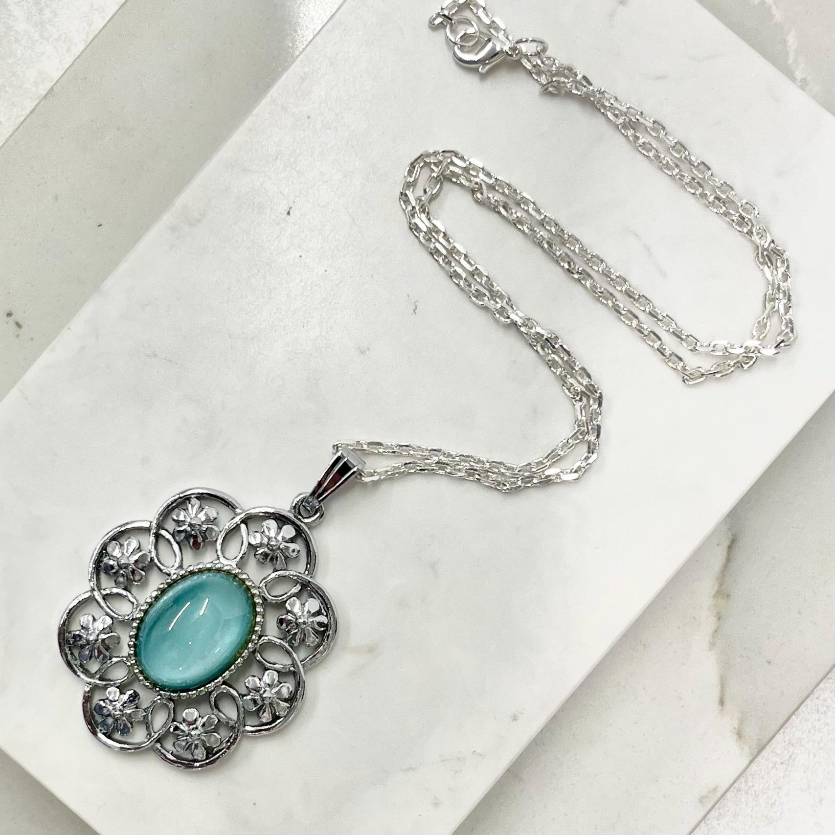 Vintage 1970‘s Floral Silver Tone Aqua Blue Glass Cabochon Pendant Necklace with an 18” Chain MillyOliverVintage