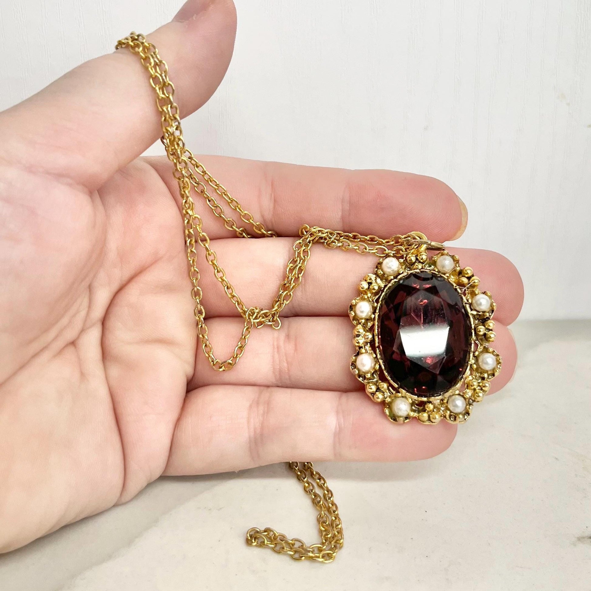 Vintage 1960‘s Gold Tone Large Amethyst Glass Pendant Necklace with Pearl Accents and a 27” Chain MillyOliverVintage