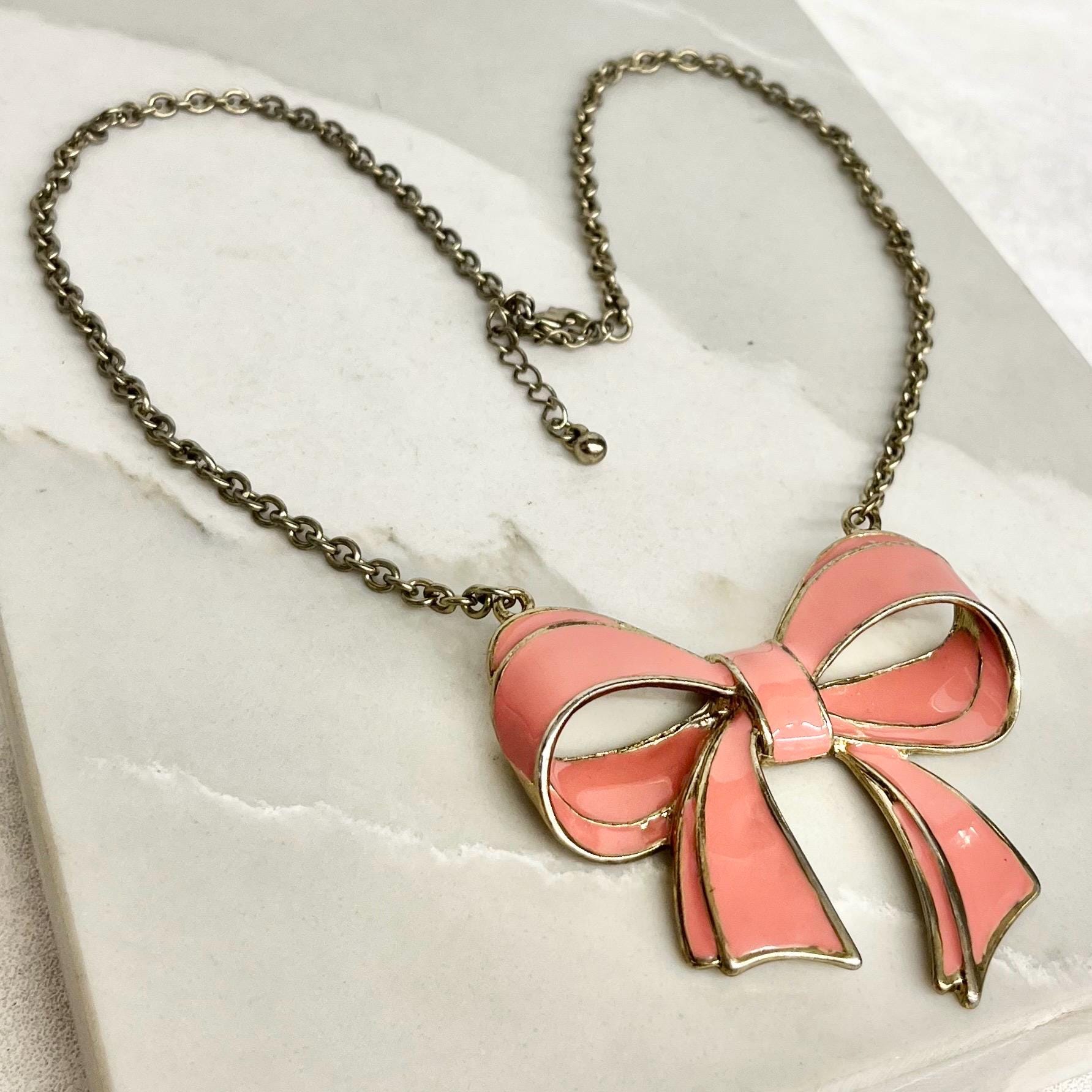 Pink Bow Necklace : Vintage Design of a Large Pink Enamelled Bow Hanging Between a Gold Tone Cutb Chain MillyOliverVintage