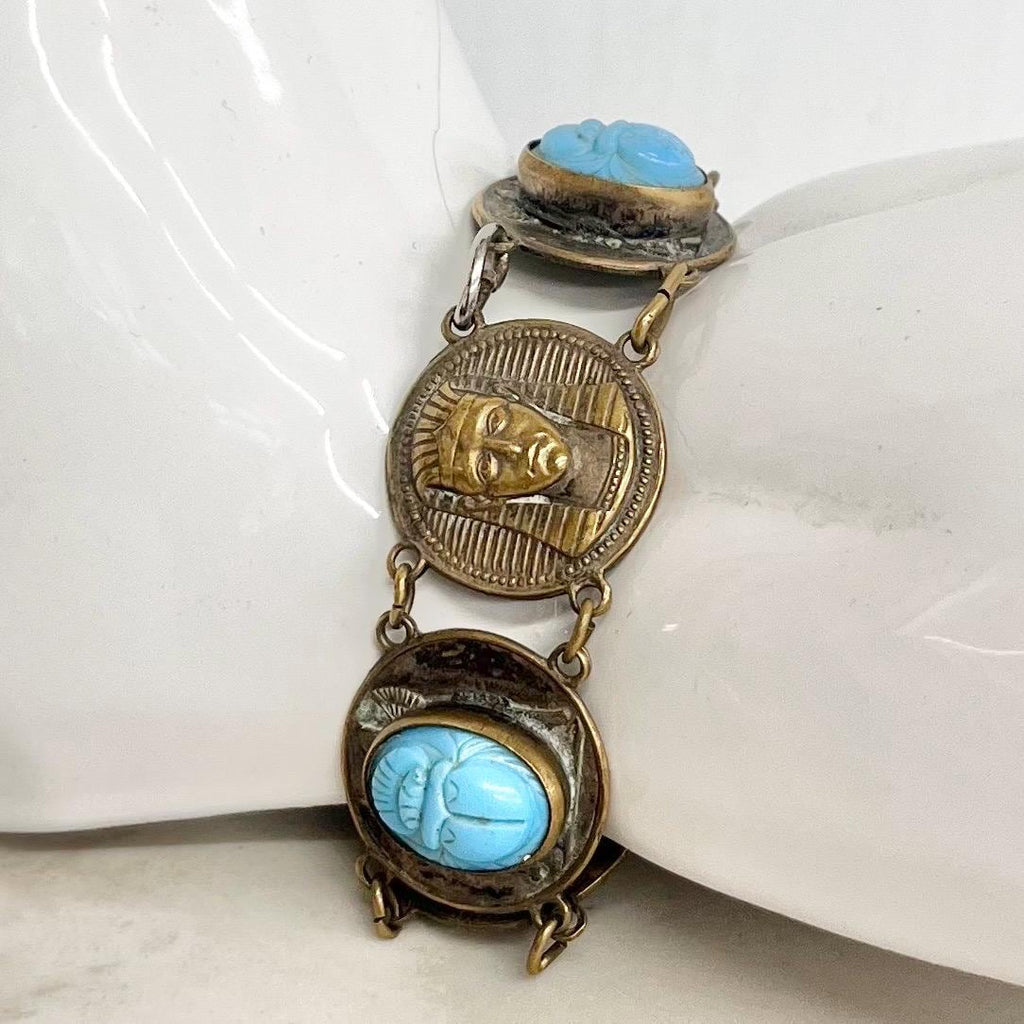 Vintage Egyptian Revival Brass Bracelet with Blue Scarab Stone and Tutankhamun Details MillyOliverVintage