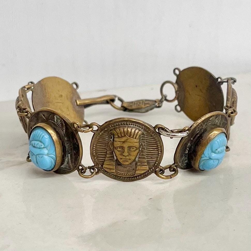 Vintage Egyptian Revival Brass Bracelet with Blue Scarab Stone and Tutankhamun Details MillyOliverVintage